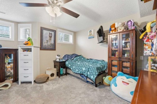 23 Prestwick Park Se, Calgary, AB - Indoor Photo Showing Bedroom