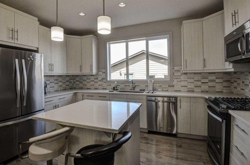 78 Marquis Heights Se, Calgary, AB - Indoor Photo Showing Kitchen With Upgraded Kitchen