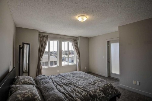 78 Marquis Heights Se, Calgary, AB - Indoor Photo Showing Bedroom