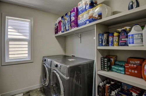 78 Marquis Heights Se, Calgary, AB - Indoor Photo Showing Laundry Room