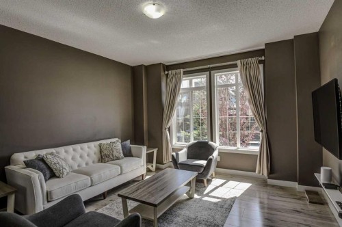 78 Marquis Heights Se, Calgary, AB - Indoor Photo Showing Living Room