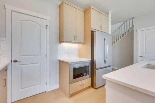 157 Wolf Hollow Drive Se, Calgary, AB - Indoor Photo Showing Kitchen