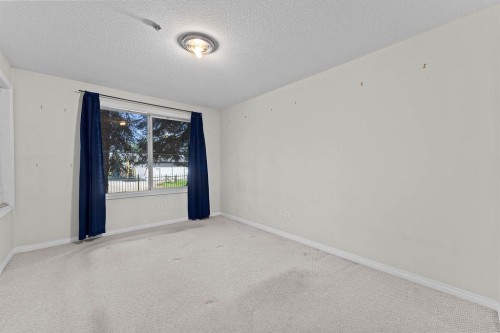 109-4507 45 Street Sw, Calgary, AB - Indoor Photo Showing Other Room