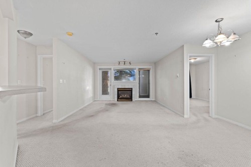 109-4507 45 Street Sw, Calgary, AB - Indoor With Fireplace