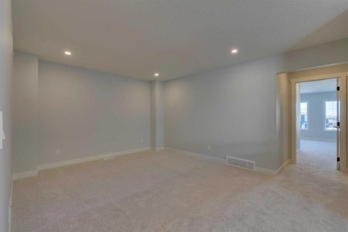 143 Creekstone Green Sw, Calgary, AB - Indoor Photo Showing Other Room