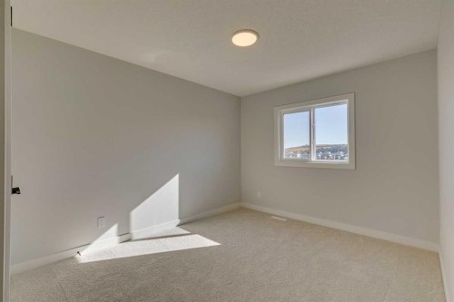 143 Creekstone Green Sw, Calgary, AB - Indoor Photo Showing Other Room