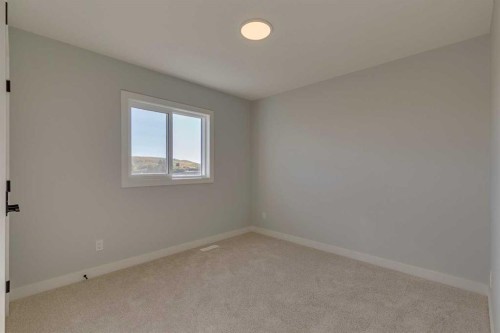 143 Creekstone Green Sw, Calgary, AB - Indoor Photo Showing Other Room