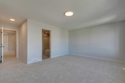 143 Creekstone Green Sw, Calgary, AB - Indoor Photo Showing Other Room