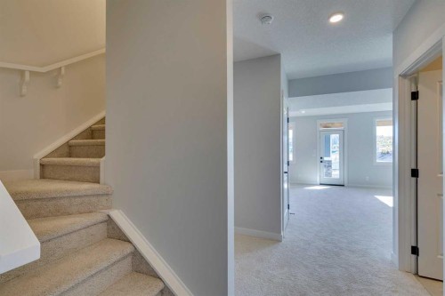143 Creekstone Green Sw, Calgary, AB - Indoor Photo Showing Other Room