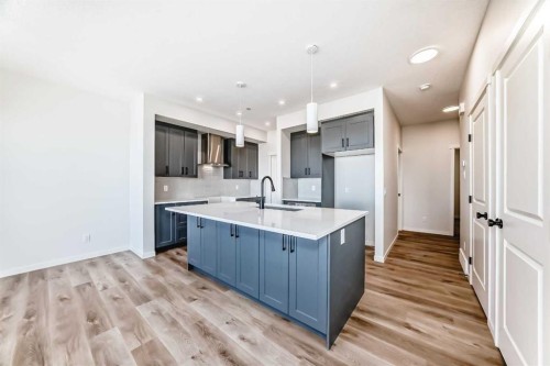 110 Hotchkiss Manor Se, Calgary, AB - Indoor Photo Showing Kitchen With Upgraded Kitchen