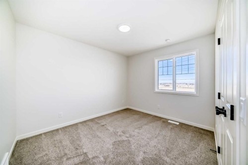110 Hotchkiss Manor Se, Calgary, AB - Indoor Photo Showing Other Room