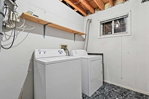 128 Ventura Way Ne, Calgary, AB - Indoor Photo Showing Laundry Room