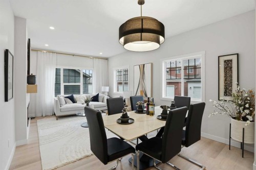 64 Buffaloberry Manor Se, Calgary, AB - Indoor Photo Showing Dining Room