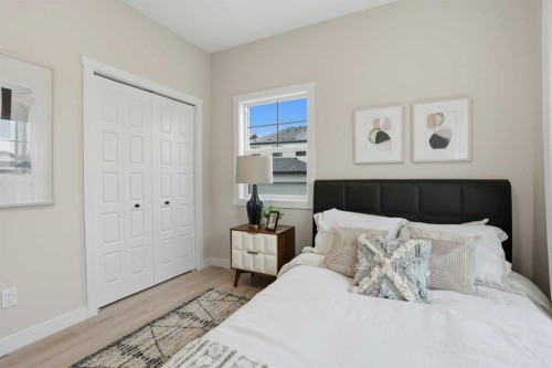 64 Buffaloberry Manor Se, Calgary, AB - Indoor Photo Showing Bedroom