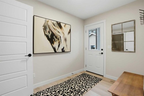 64 Buffaloberry Manor Se, Calgary, AB - Indoor Photo Showing Other Room