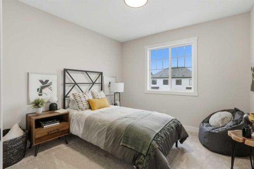 64 Buffaloberry Manor Se, Calgary, AB - Indoor Photo Showing Bedroom