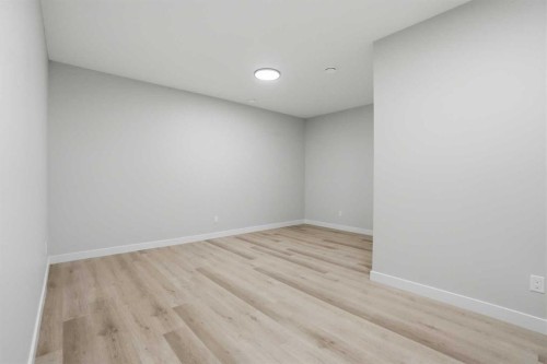 64 Buffaloberry Manor Se, Calgary, AB - Indoor Photo Showing Other Room