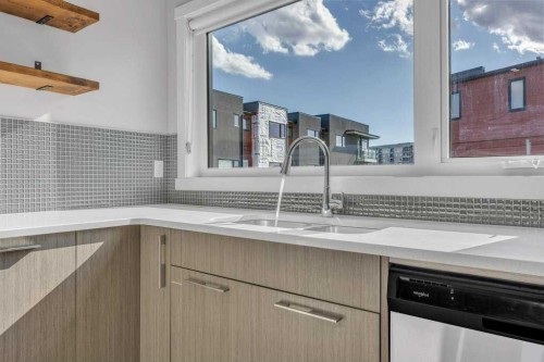 903-218 Sherwood Square Nw, Calgary, AB - Indoor Photo Showing Kitchen With Double Sink With Upgraded Kitchen