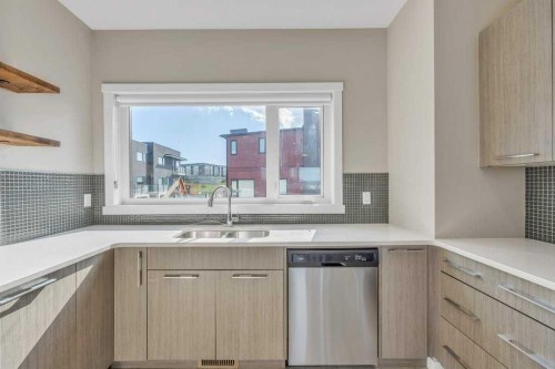 903-218 Sherwood Square Nw, Calgary, AB - Indoor Photo Showing Kitchen With Double Sink