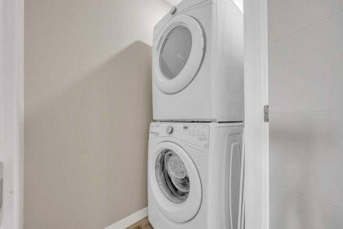 903-218 Sherwood Square Nw, Calgary, AB - Indoor Photo Showing Laundry Room
