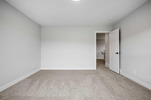 76 Creekview Manor Sw, Calgary, AB - Indoor Photo Showing Other Room