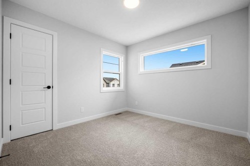 76 Creekview Manor Sw, Calgary, AB - Indoor Photo Showing Other Room