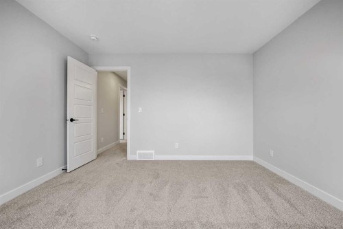 76 Creekview Manor Sw, Calgary, AB - Indoor Photo Showing Other Room