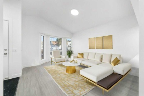 361 Martinwood Place Ne, Calgary, AB - Indoor Photo Showing Living Room