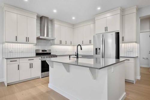 56 Creekstone Grove Sw, Calgary, AB - Indoor Photo Showing Kitchen With Upgraded Kitchen