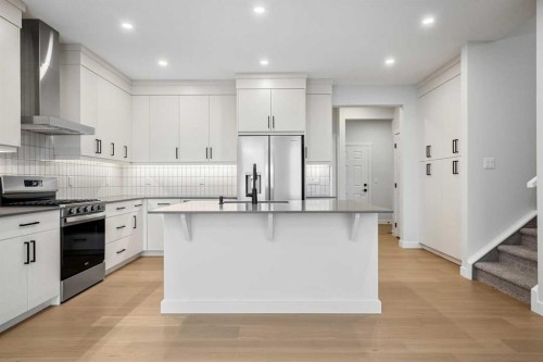 56 Creekstone Grove Sw, Calgary, AB - Indoor Photo Showing Kitchen With Upgraded Kitchen