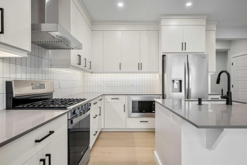 56 Creekstone Grove Sw, Calgary, AB - Indoor Photo Showing Kitchen With Upgraded Kitchen