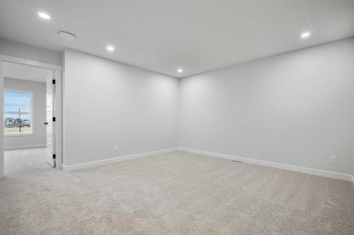 56 Creekstone Grove Sw, Calgary, AB - Indoor Photo Showing Other Room