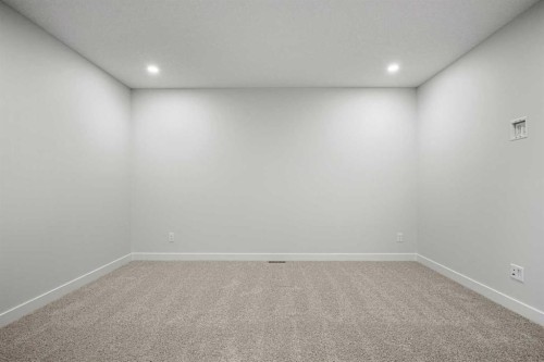 56 Creekstone Grove Sw, Calgary, AB - Indoor Photo Showing Other Room