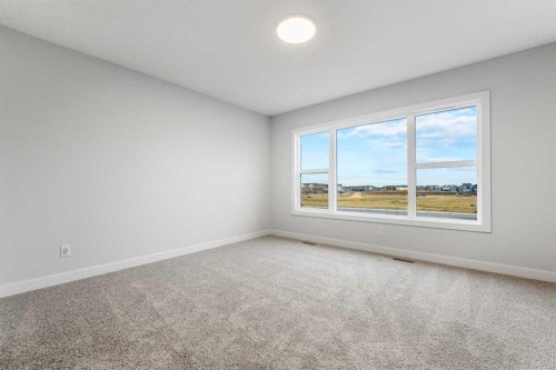 56 Creekstone Grove Sw, Calgary, AB - Indoor Photo Showing Other Room