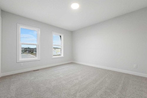 56 Creekstone Grove Sw, Calgary, AB - Indoor Photo Showing Other Room