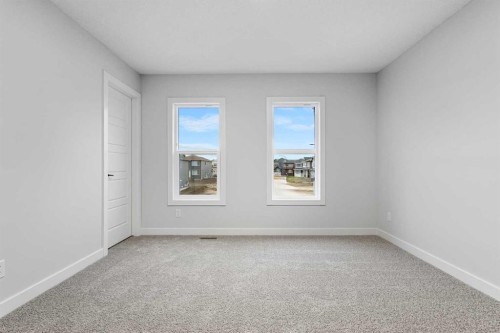 56 Creekstone Grove Sw, Calgary, AB - Indoor Photo Showing Other Room