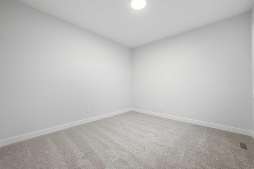 56 Creekstone Grove Sw, Calgary, AB - Indoor Photo Showing Other Room
