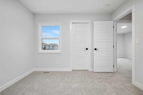 56 Creekstone Grove Sw, Calgary, AB - Indoor Photo Showing Other Room