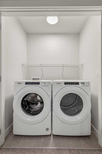 56 Creekstone Grove Sw, Calgary, AB - Indoor Photo Showing Laundry Room