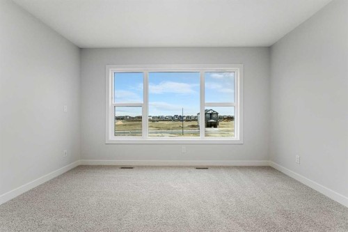 56 Creekstone Grove Sw, Calgary, AB - Indoor Photo Showing Other Room