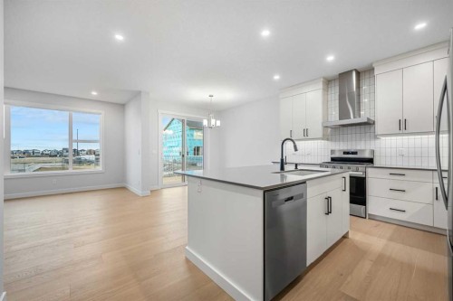 56 Creekstone Grove Sw, Calgary, AB - Indoor Photo Showing Kitchen With Upgraded Kitchen