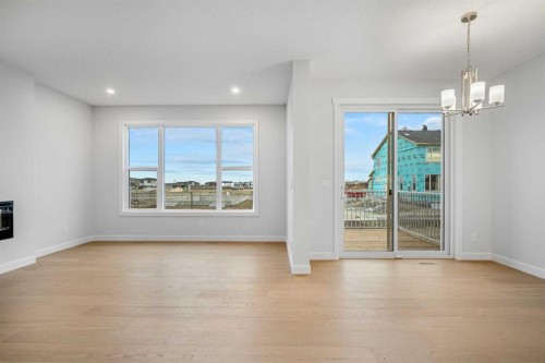 56 Creekstone Grove Sw, Calgary, AB - Indoor With Fireplace