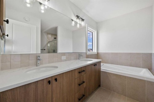 38 Amblefield Common Nw, Calgary, AB - Indoor Photo Showing Bathroom