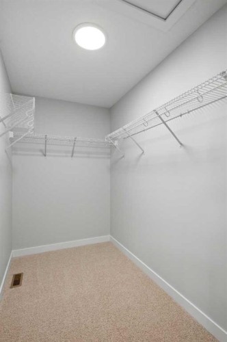 38 Amblefield Common Nw, Calgary, AB - Indoor With Storage