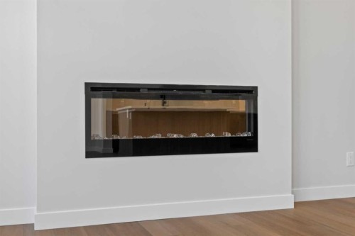 38 Amblefield Common Nw, Calgary, AB - Indoor With Fireplace