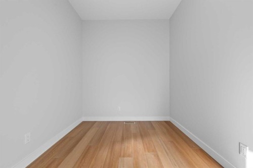 38 Amblefield Common Nw, Calgary, AB - Indoor Photo Showing Other Room