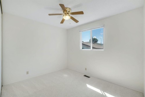 127 Falshire Way Ne, Calgary, AB - Indoor Photo Showing Other Room