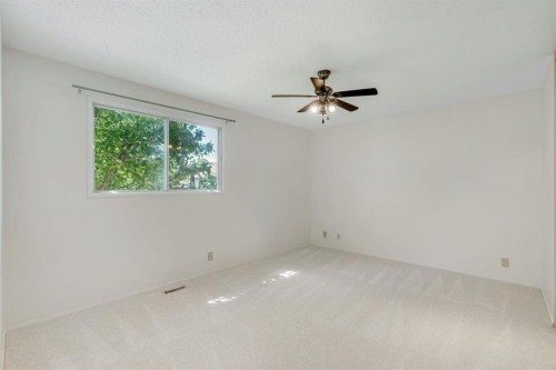 127 Falshire Way Ne, Calgary, AB - Indoor Photo Showing Other Room