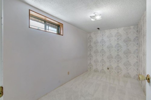 127 Falshire Way Ne, Calgary, AB - Indoor Photo Showing Other Room