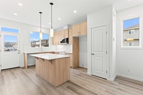 918 Creekside Boulevard Sw, Calgary, AB - Indoor Photo Showing Kitchen